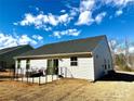 Charming home featuring a cozy fenced patio area, perfect for outdoor relaxation and entertaining under sunny skies at 505 Grandiflora Ave, Lancaster, SC 29720