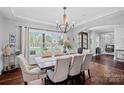 Formal dining room with chandelier and hardwood floors at 582 Barber Loop, Mooresville, NC 28117