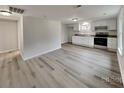 Modern kitchen with white cabinets and stainless steel appliances at 105 Valley Ave, Clover, SC 29710