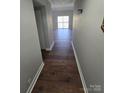 Bright entryway with hardwood floors leading to living room at 1050 21St Nw Ave # 70, Hickory, NC 28601