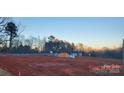 New home construction site featuring cleared land and foundation at 211 Benfield Rd, Kings Mountain, NC 28086