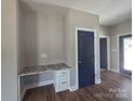 Cozy office nook includes granite countertop, built-in cabinets and drawers, providing functional workspace at 211 Benfield Rd, Kings Mountain, NC 28086