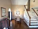 Formal dining room with hardwood floors and chandelier at 2521 Whistler Ct, Newton, NC 28658