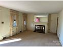 Living room with fireplace and large mirror at 147 W Mcneely Ave, Mooresville, NC 28115