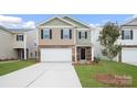 Two-story home with neutral siding and a white garage door at 3490 Buck Ct, Gastonia, NC 28056