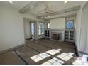 Spacious living room featuring a fireplace and built-in shelving at 718 Barrel Aly, Fort Mill, SC 29715