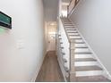 Hallway with a view of the front door and staircase at 8125 Houser St, Cornelius, NC 28031