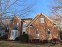 Two-story brick home with a large front yard at 130 Swift Creek Ln, Mooresville, NC 28115