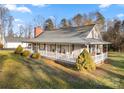 Ranch home with large porch, showcasing a side view at 1360 Hopewell Church Rd, Catawba, NC 28609