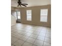 Spacious living room with tile floors and a ceiling fan at 217 22Nd Sw St # H, Hickory, NC 28602