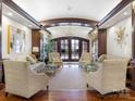 Spacious lobby with comfortable seating and a modern chandelier at 2223 Croydon Rd # 103, Charlotte, NC 28207