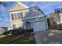 Two-story house with attached garage and basketball court at 2409 Deberry Ct, Charlotte, NC 28213