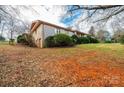 Brick ranch house with attached garage and landscaping at 641 20Th Avenue Nw Dr, Hickory, NC 28601