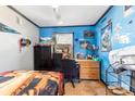 Spacious bedroom with a Carolina Panthers theme and ample closet space at 6534 Monteith Dr, Charlotte, NC 28213