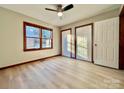 Bright bedroom with double closets and wood-look flooring at 69 Saint Charles Ct, Hickory, NC 28601