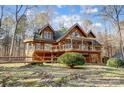 Rustic log home nestled in woods with wrap-around deck at 7404 Mockingbird Ln # 73, Waxhaw, NC 28173