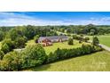 Aerial view of the property showing the building and surrounding area at 1318 Ostwalt Amity Rd, Cleveland, NC 27013