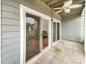 Private patio with sliding glass doors leading to the interior at 237 Northwest Dr, Davidson, NC 28036
