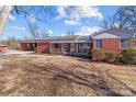 Front view of a brick ranch house at 200 11Th St, Spencer, NC 28159