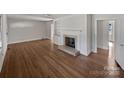 Living room featuring hardwood floors and a fireplace at 2042 Country Ct, Rock Hill, SC 29732