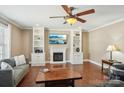 Living room features built-in shelving and a fireplace at 2720 Hill Top Dr, Salisbury, NC 28147