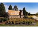 Bailey Run community entrance with stone and wood signage at 7228 Hodges Meadow Ln, Charlotte, NC 28213