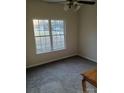 Spacious bedroom with a large window and neutral carpeting at 1331 Copper Creek Ln, Fort Mill, SC 29715