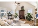 Spacious living room with vaulted ceiling, hardwood floors, and lots of natural light at 1575 Riverwalk Pkwy, Rock Hill, SC 29730