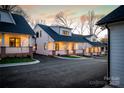 View of three charming homes at sunset at 2002 Summey Ave # 3, Charlotte, NC 28205