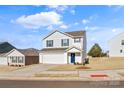 Two-story house with white siding, a two-car garage, and a blue front door at 2513 Celestial Dr, Newton, NC 28568