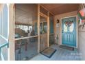 Screened porch with access to the front door at 3870 Elkwood Ct, Concord, NC 28025