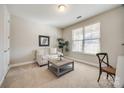 Cozy bedroom with neutral decor and ample natural light at 11241 Black Brant Ln, Charlotte, NC 28278