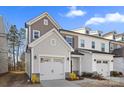 Charming exterior of a two-story townhome with a gray and white facade at 14041 Whistling Teal Dr, Charlotte, NC 28262