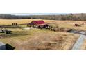 Barn venue with a large open field, trees, and a long driveway at 15554 Highway 601 S Hwy, Midland, NC 28107