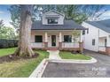 Charming craftsman style home with front porch and landscaped yard at 2002 Summey Ave # 4, Charlotte, NC 28205