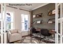 Bright home office with built-in shelves and workspace for two at 2173 Millennium Dr # 40, Lancaster, SC 29720