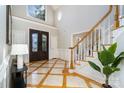 Impressive two-story entry with a dramatic staircase at 2510 Tulip Hill Dr, Charlotte, NC 28270