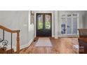 Elegant entryway with double doors and hardwood floors at 4628 Rustling Woods Dr, Denver, NC 28037