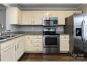 Well-equipped kitchen featuring stainless steel appliances and granite countertops at 8272 Golf Ridge Dr, Charlotte, NC 28277