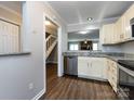 Bright kitchen with granite countertops, stainless steel appliances, and hardwood flooring at 8272 Golf Ridge Dr, Charlotte, NC 28277