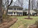 Traditional two-story home with a well maintained lawn and complementing shrubbery at 3153 Wimbledon Ln, Rock Hill, SC 29732