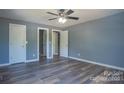 Spacious bedroom with gray walls and wood-look floors at 4335 Saluda Rd, Rock Hill, SC 29730