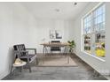 Bright home office features a desk, chair, and large window at 6518 Afterglow Dr, Indian Trail, NC 28079