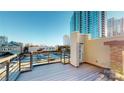 Private rooftop deck with city views and a gas fireplace at 701 N Church St # 9, Charlotte, NC 28202