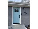 Charming light blue front door welcomes you to this updated home at 757 Bilmark Ave, Charlotte, NC 28213