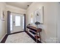 Bright and airy foyer with hardwood floors and modern decor at 975 Shorthill Ln, Fort Mill, SC 29715