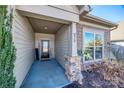 Inviting front porch entryway with stone accents at 975 Shorthill Ln, Fort Mill, SC 29715