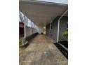 View of the carport featuring lattice and access to the backyard at 1064 S Stonewall Ave, Rock Hill, SC 29732