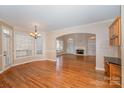 Bright dining room with hardwood floors and access to the kitchen at 11805 Prestmoor Ct, Charlotte, NC 28262