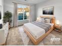 Virtually staged bedroom with light walls and a large window at 8835 Merrie Rose Ave, Charlotte, NC 28213